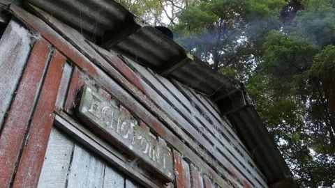 Smoke out of chimney of Echo Point hut Stock Footage 72153548