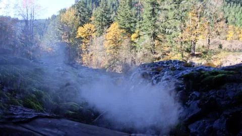 Smoke over log Stock Photos