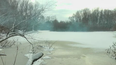 Smoke over a winter pond Stock Footage 47650454
