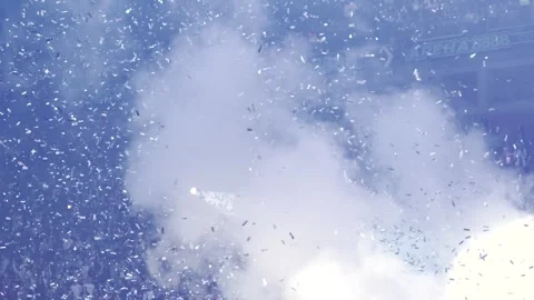 Smoke particles fall on audience at a concert in a hall in slow motion Stock Footage 303472125
