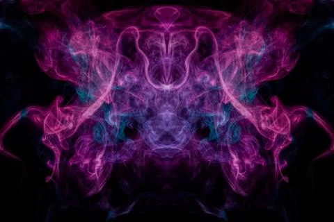 Smoke of pattern pink and blue  in the form of horror monster on a dark isola Stock Photos