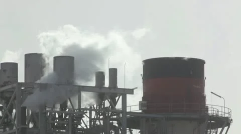 Smoke &amp; pollution. Chimneys emitting gasses and vapors in harbor zone. Stock Footage 12721177