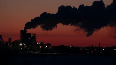 Smoke pollution silhouette sunset Video stock 74248960