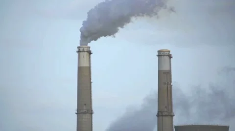 Smoke is pouring out of a chimney stack. Stock Footage 64342025