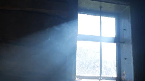 Smoke in a ray. Light falling from a window 6 Video stock 128486230