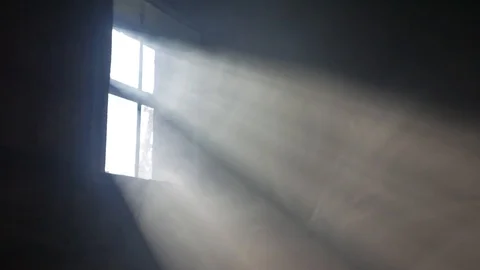 Smoke in the rays of light from the window. Room. Stock Footage 116015664