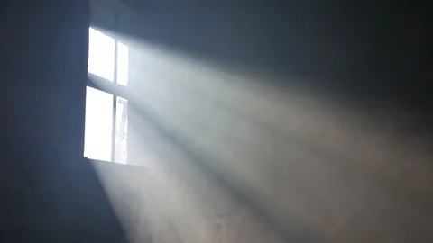 Smoke in the rays of light from the window. Room. Stock Footage 116015935