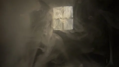 Smoke in the rays of light from the window. Room. Stock Footage 145864526