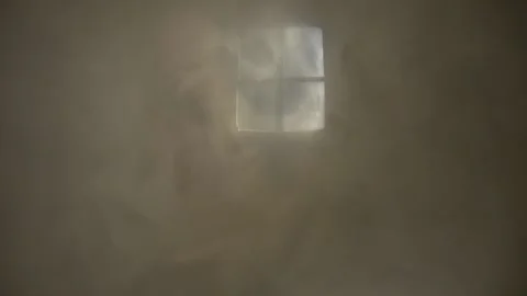 Smoke in the rays of light from the window. Room. Stock Footage 145886957