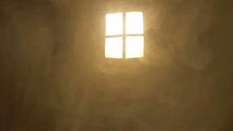 Smoke in the rays of light from the window. Room. Stock Footage 145988230