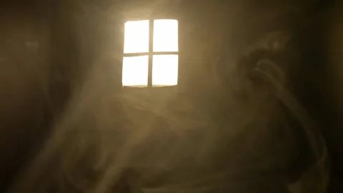 Smoke in the rays of light from the window. Room. Stock Footage 145988726
