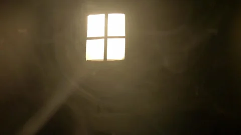 Smoke in the rays of light from the window. Room. Stock Footage 145988823