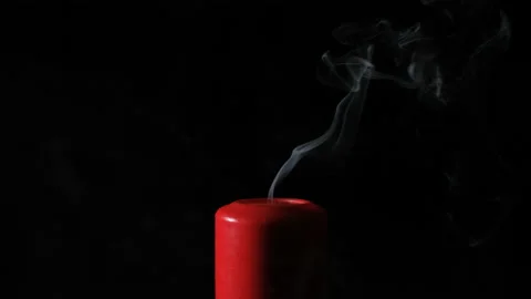 Smoke from red candle on the black background Stock Footage 144468161