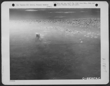 Smoke Rises From Exploding Bombs Which Have Hit Their Targets On An Enemy ... Stock Photos