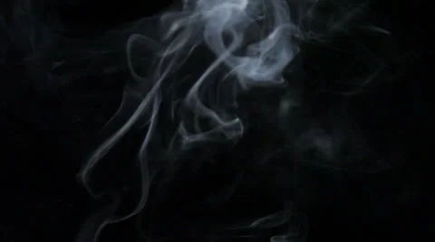 Smoke rises to the top on black background. Video stock 48488595