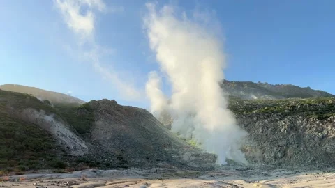 Smoke rising from active volcano landscape Stock Footage 245794083