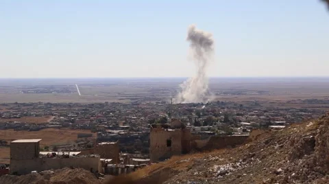Smoke Rising from Attack on ISIS in remote town in Iraq Stock Footage 56904956