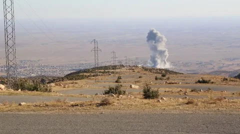 Smoke Rising from Attack on ISIS in remote Iraq Stock Footage 56905030