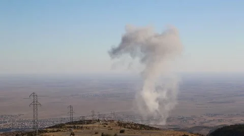 Smoke Rising from Attack on ISIS in remote Iraq Stock Footage 56905100
