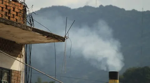 Smoke rising from chimney Stock Footage 10787744