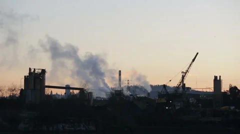 Smoke rising from a factory Stock Footage 60772677