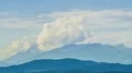 Smoke rising over steaming active volcano, beautiful landscape, time-lapse 4k or 4k+ Resolution