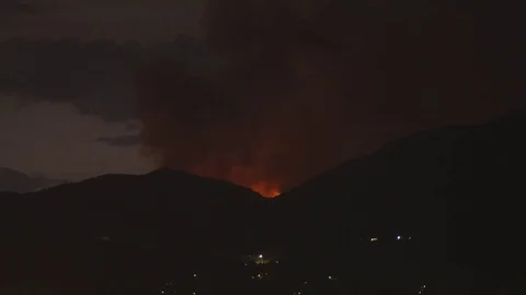 Smoke Rising From Valley Stock Footage 79604568