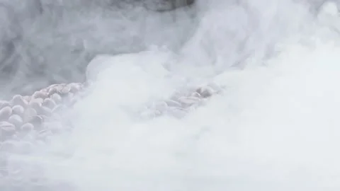 Smoke sets the stage for roasted coffee beans. Stock Footage 195080214