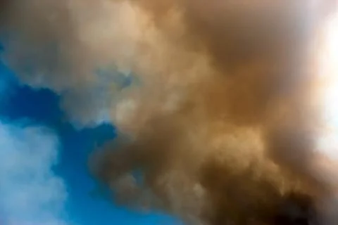 Smoke in the sky 库存照片