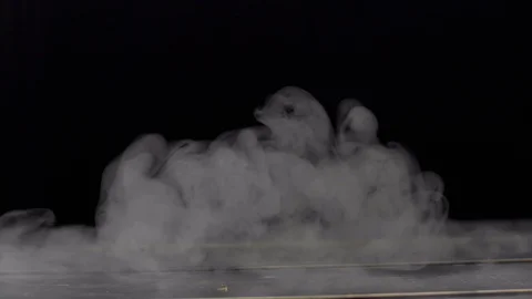 Smoke in slow motion on black background. Stock Footage 112429578