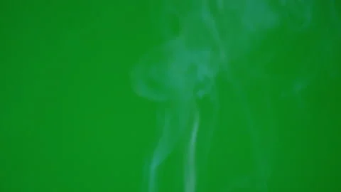 Smoke slow motion flowing up on green screen background Stockbeeldmateriaal 238512919