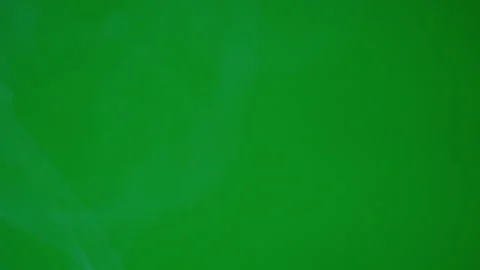Smoke slow motion flowing up on green screen background Video stock 238512959