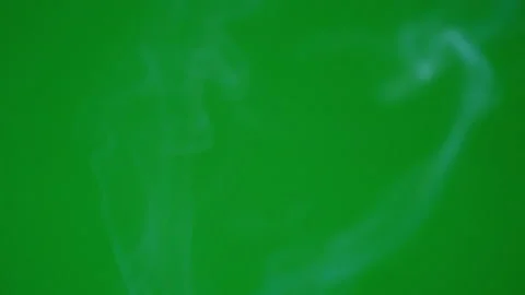 Smoke slow motion flowing up on green screen background Stock-Footage 238512990