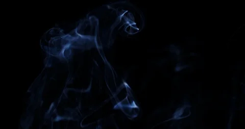 Smoke slowly floating through space against black background. Vídeo Stock 87824699