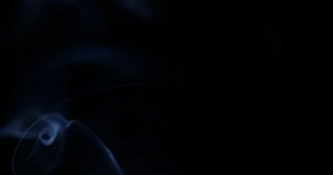 Smoke slowly floating through space against black background. Stock Footage 87826392