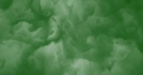 Smoke slowly floating through space against chroma key green screen Stock Footage 328810619