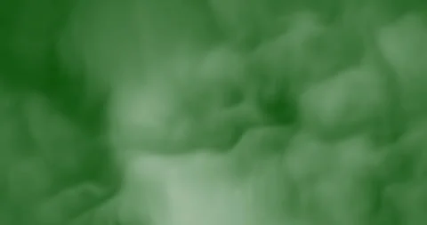 Smoke slowly floating through space against chroma key green screen Stock Footage 330530468