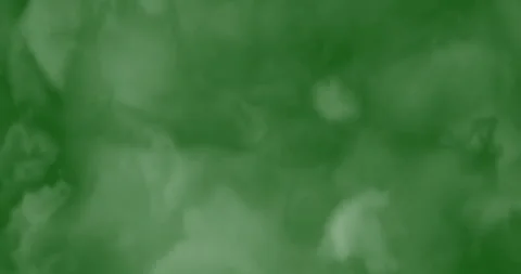 Smoke slowly floating through space against chroma key green screen Video stock 332653797