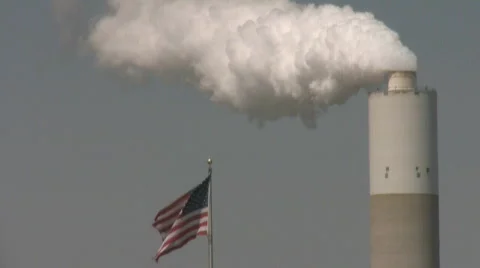 Smoke stack and flag Stock Footage 404773