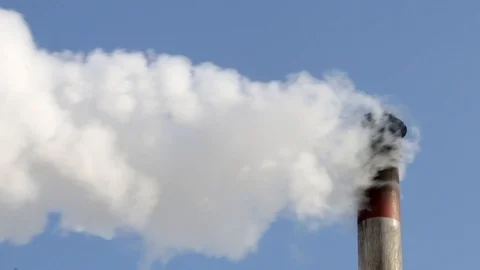 Smoke stack on blue sky background. Stock Footage 86859655