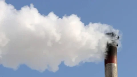 Smoke stack on blue sky background Stock Footage 86859802