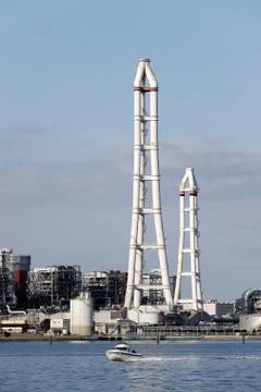 Smoke stack on a blue sky Stock Photos