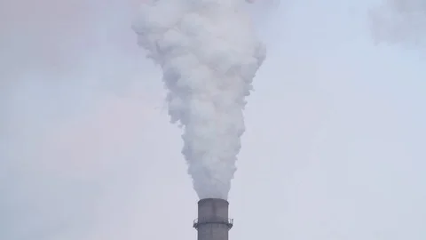 Smoke stack at coal fired power plant. Close up on grey background. Stock Footage 108888208
