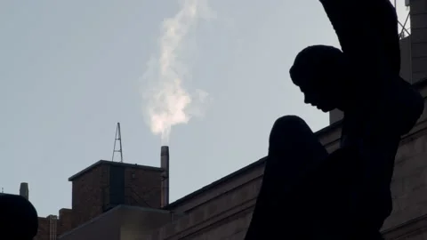 Smoke Stack downtown with Statue Video stock 155527277