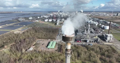 Smoke stack fumes, on large industrial zone refinery. CO2 emissions. CLose up Stock Footage 266942181