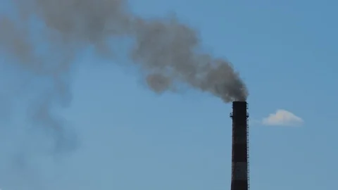Smoke stack from industrial chimney, against blue sky. Pollution atmosphere Stock Footage 111277153