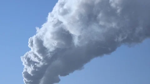 Smoke stack with a nice smoke over blue sky 003 스톡 동영상 102680016