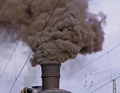 Smoke stack of an old lokomotive Stock Photos