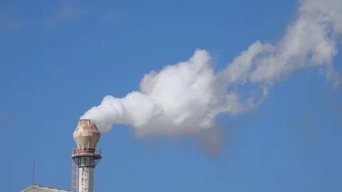 Smoke stack. Smoke comes from white chimney against sky. Stock Footage 93397764