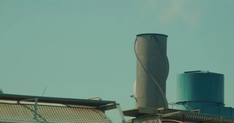 Smoke Stack Spews Pollution Drive-by 4K Stock-Footage 158778812
